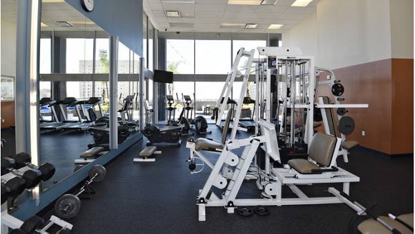 fitness center at Houston House Apartments