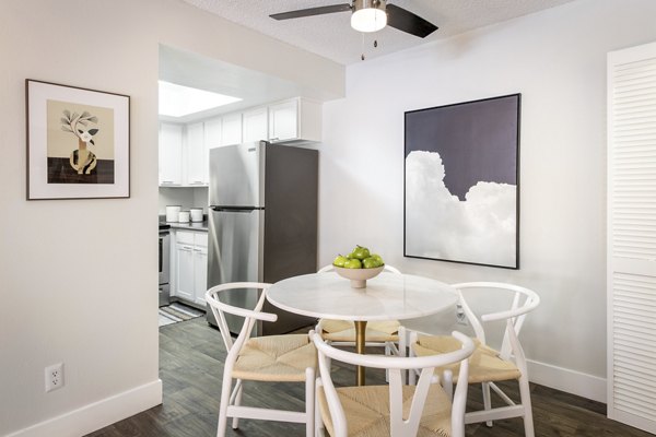 Dining area with modern decor at The Ridge at Mountain View Apartments