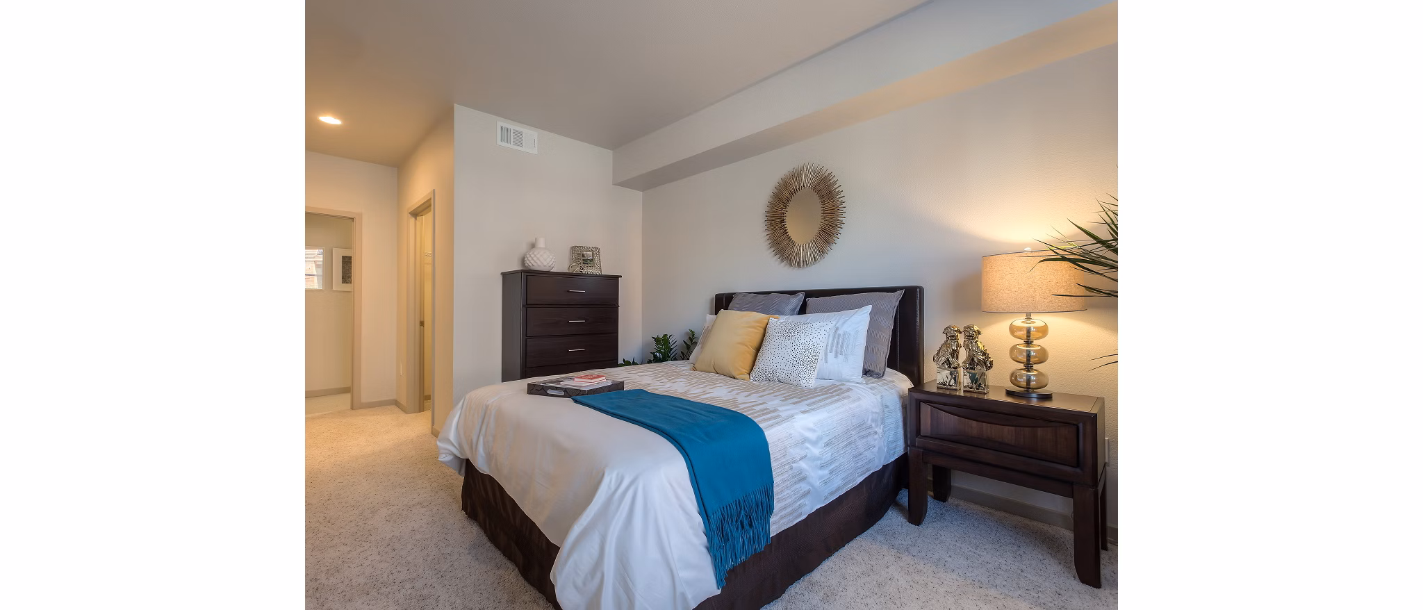 121 Tasman Apartments: Cozy bedroom with modern furnishings near Milpitas
