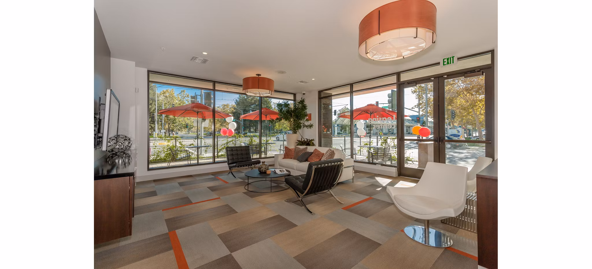 Clubhouse featuring modern decor and spacious seating at 121 Tasman Apartments