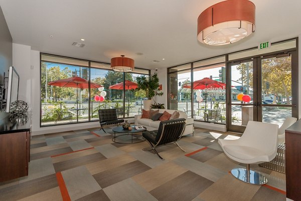 Clubhouse featuring modern decor and spacious seating at 121 Tasman Apartments