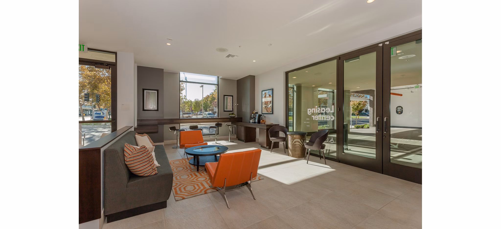 Clubhouse at 121 Tasman Apartments featuring modern design and comfortable seating areas for social gatherings
