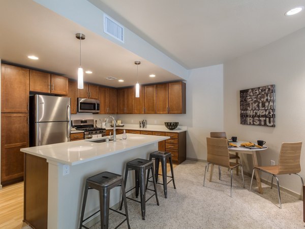 Elegant dining room with modern furnishings at 121 Tasman Apartments