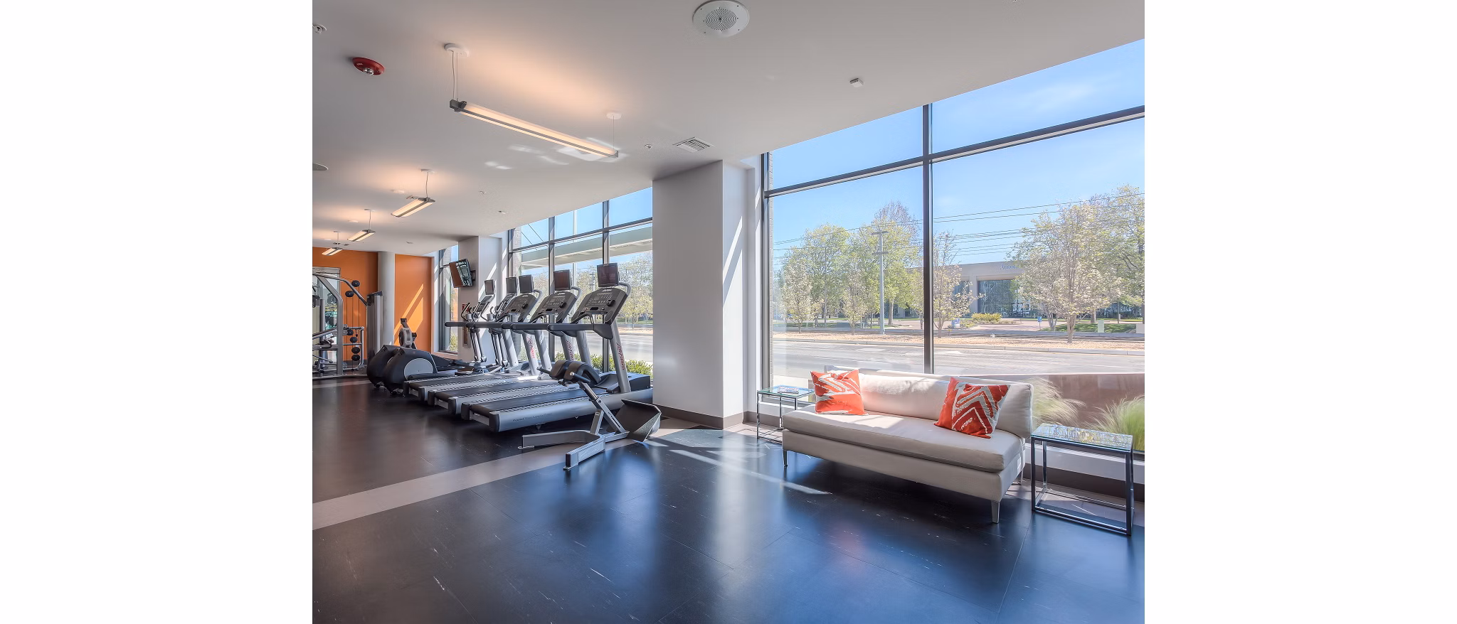 Modern fitness room featuring state-of-the-art equipment at 121 Tasman Apartments
