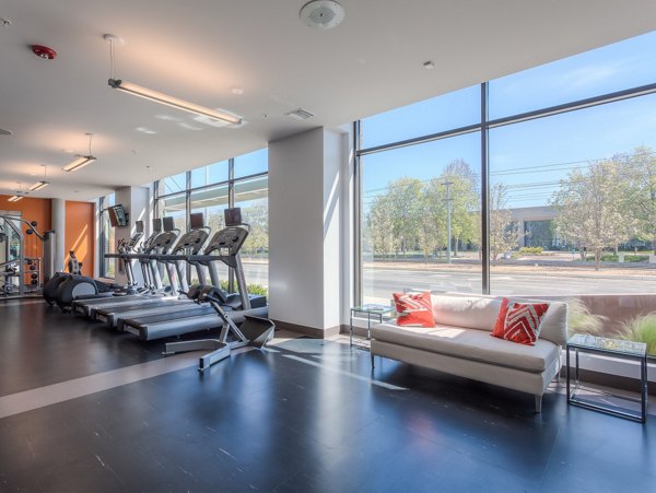 Modern fitness room featuring state-of-the-art equipment at 121 Tasman Apartments