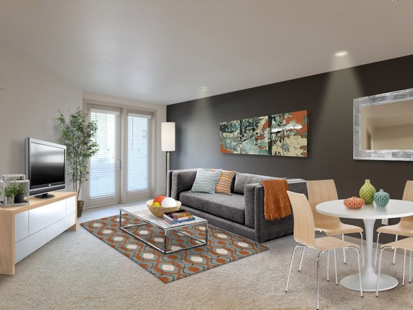 Modern living room with elegant decor and bright lighting at 121 Tasman Apartments