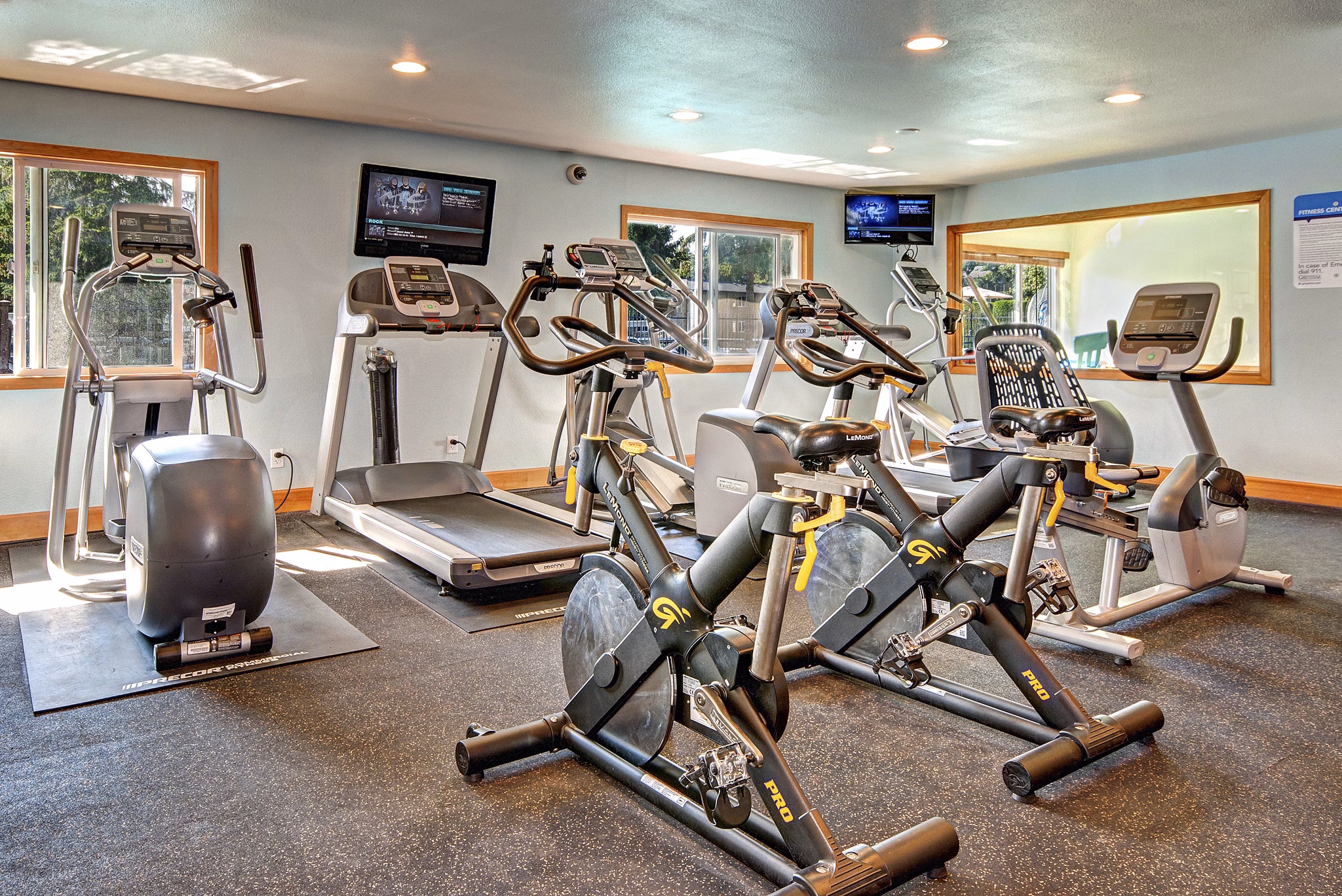 Modern fitness center with state-of-the-art equipment at Central Park East Apartments