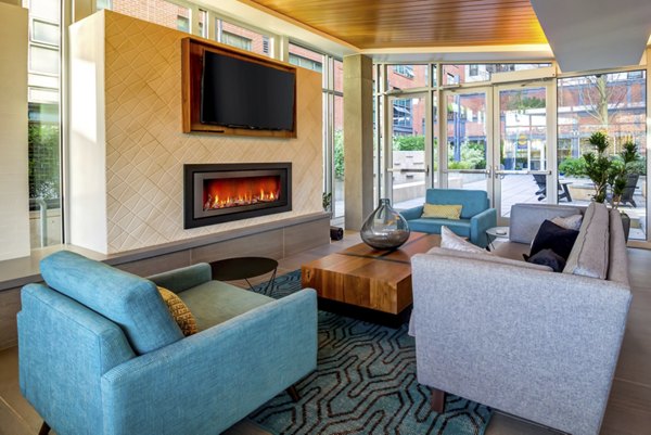 Clubhouse featuring modern design and comfortable seating at Equinox Apartments