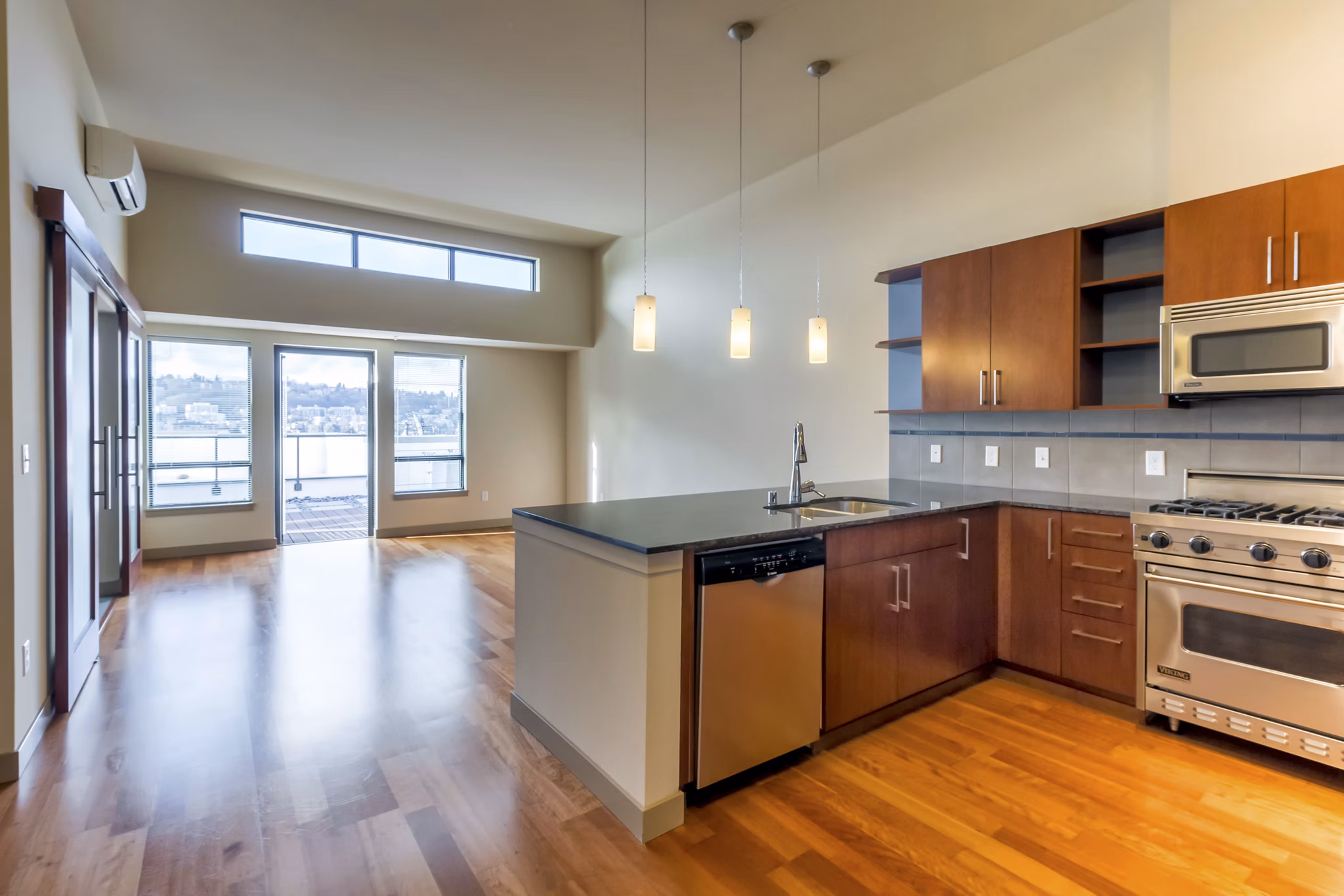 State-of-the-art fitness center with modern equipment at Equinox Apartments offering wellness for residents