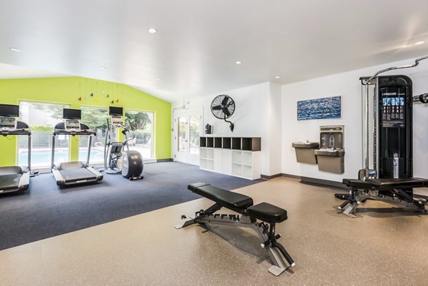 fitness center at The Woodlands Apartments