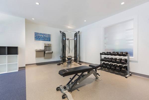fitness center at The Woodlands Apartments