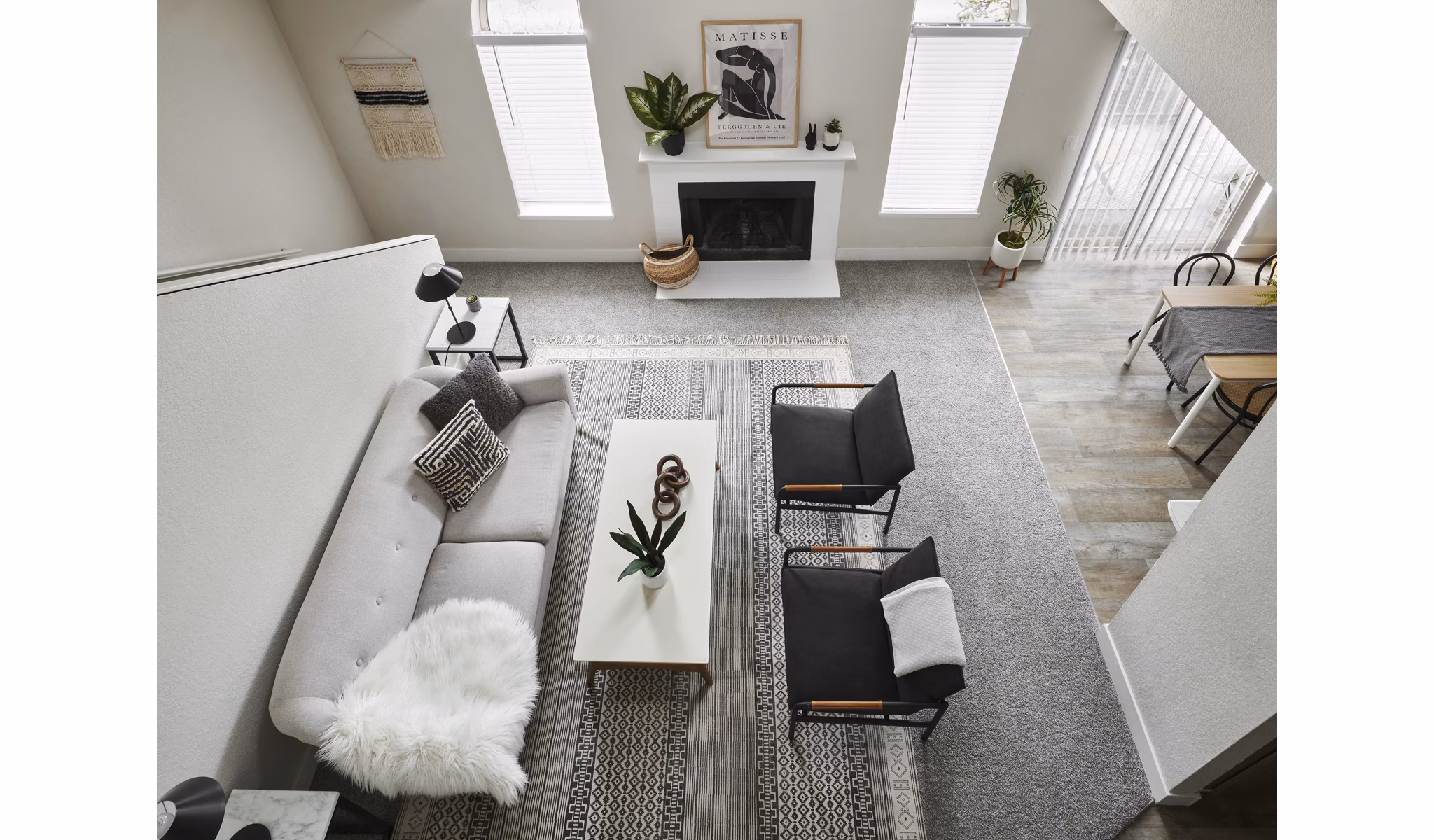 Spacious living room with modern decor in The Woodlands Apartments