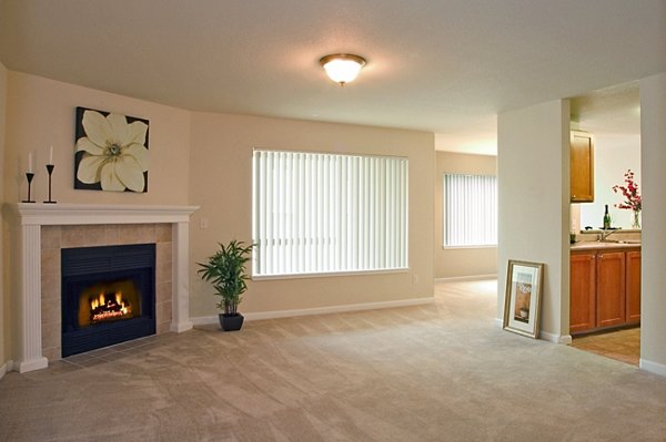 Spacious living room with modern furnishings at Island Homestead Apartments