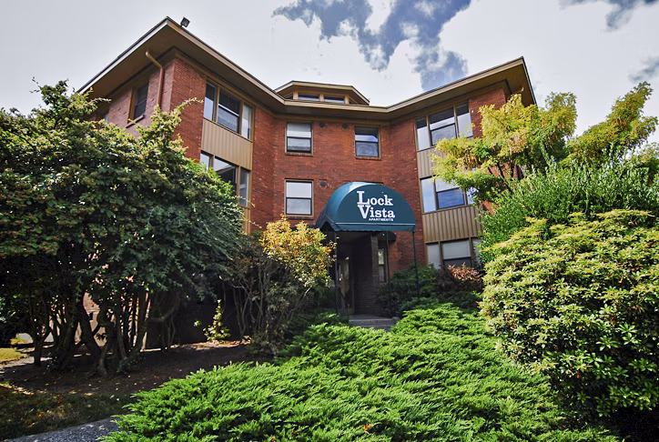 Lock Vista Apartments: Scenic view of modern luxury apartments in a serene setting