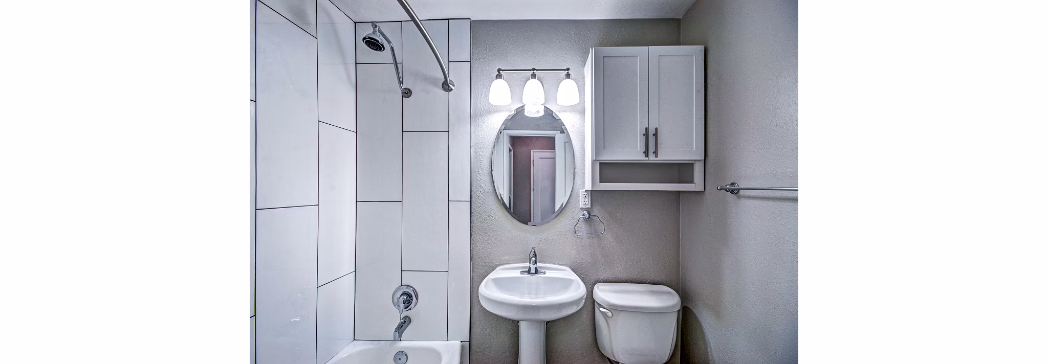 Modern bathroom with sleek fixtures at Lock Vista Apartments, featuring spacious design and luxury finishes for a comfortable living experience
