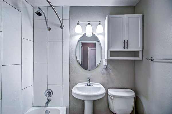Modern bathroom with sleek fixtures at Lock Vista Apartments, featuring spacious design and luxury finishes for a comfortable living experience