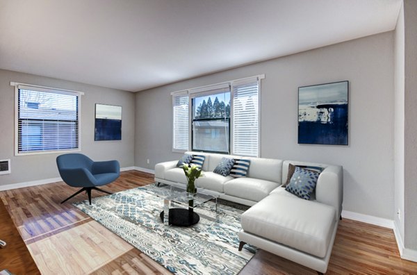 Spacious living room with modern furnishings at Lock Vista Apartments, offering comfort and style in a luxury environment