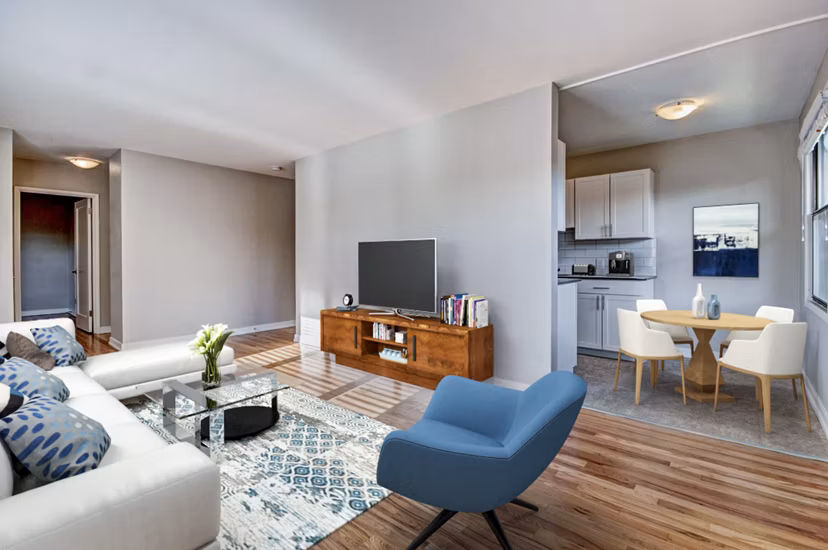 Cozy living room with modern dÃ©cor and natural light at Lock Vista Apartments