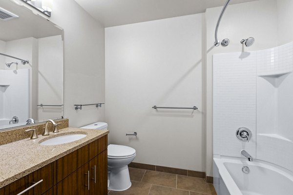 Modern bathroom with sleek fixtures at Via 6 Apartments, offering luxury living in the heart of downtown