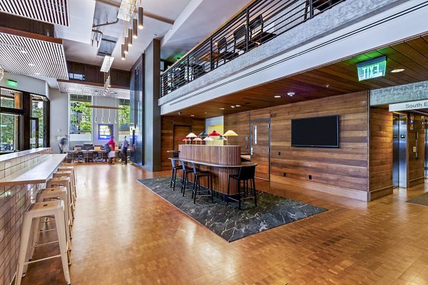 Modern clubhouse featuring sleek design and communal spaces at Via 6 Apartments, luxury living in the heart of Seattle's vibrant community