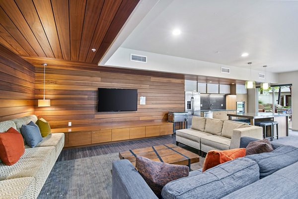 Spacious clubhouse with modern dÃ©cor at Allez Apartments, perfect for gatherings and events in a luxury setting