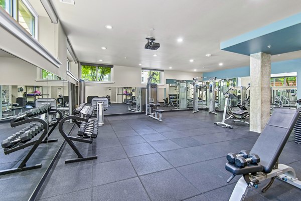 Modern fitness center with state-of-the-art equipment at Allez Apartments