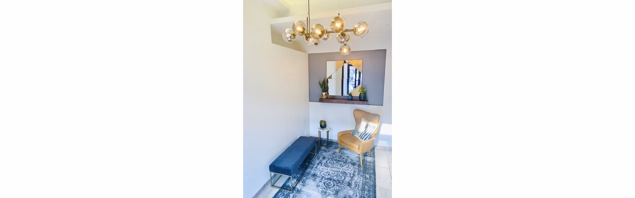 Contemporary hallway with sleek lighting at The Atlantic Stamp Building Apartments, a luxury property managed by Greystar