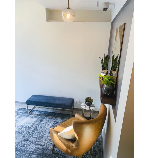 Spacious hallway with modern lighting at The Atlantic Stamp Building Apartments, offering luxury living at Greystar's prime location
