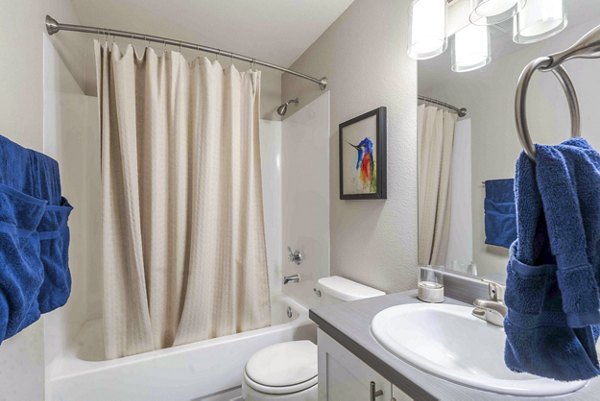 Contemporary bathroom with sleek fixtures at Avana One Zero Nine Apartments