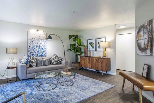 Modern living room with stylish decor at Avana One Zero Nine Apartments, offering luxury living spaces in a vibrant community