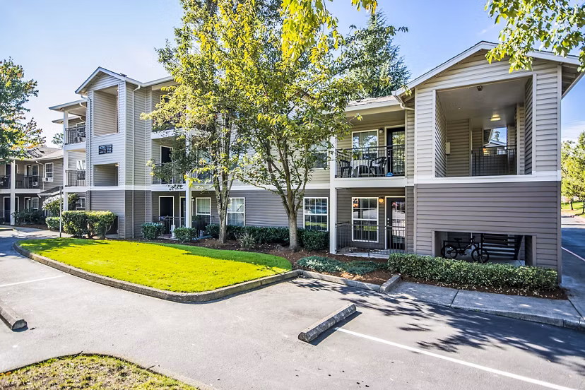 Seven West at the Trails: Luxury apartment building showcasing modern design in scenic setting