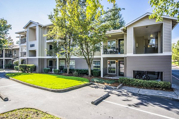 Seven West at the Trails: Luxury apartment building showcasing modern design in scenic setting