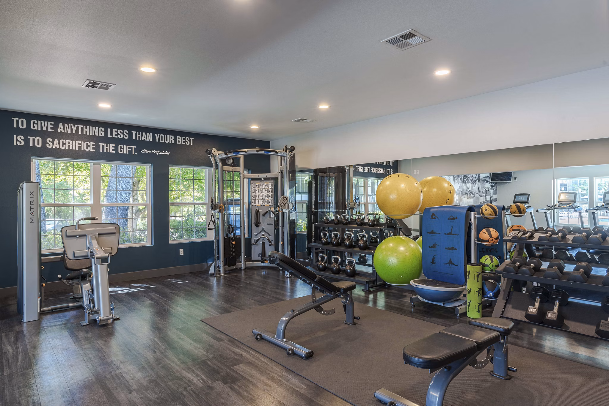 fitness center at Seven West at the Trails Apartments