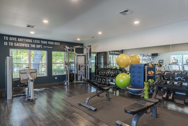 fitness center at Seven West at the Trails Apartments