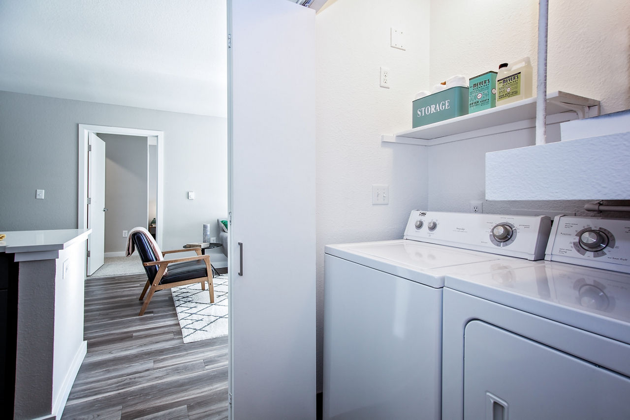 Laundry room at Seven West At The Trails
