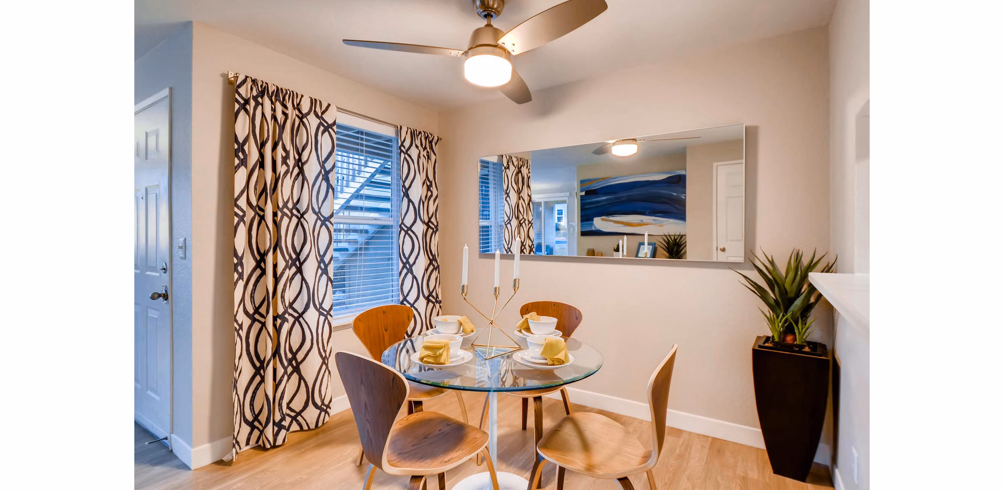 Elegant dining room with modern furnishings at Rivercrest Meadows Apartments