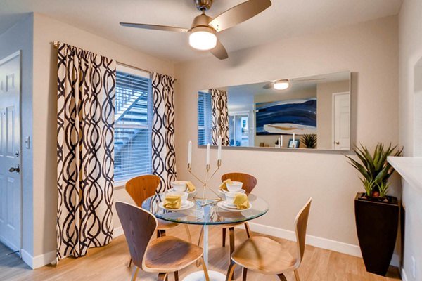 Elegant dining room with modern furnishings at Rivercrest Meadows Apartments