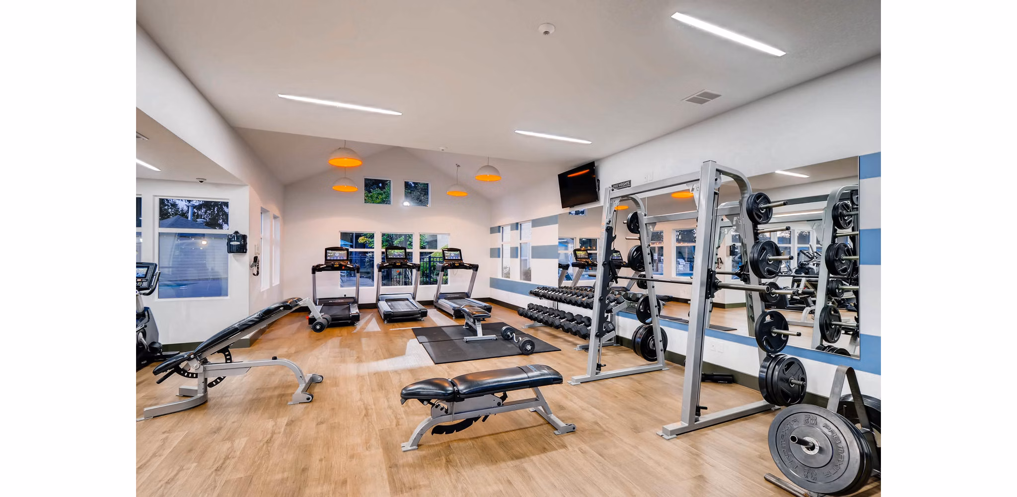 State-of-the-art fitness center with modern equipment at Rivercrest Meadows Apartments for active living