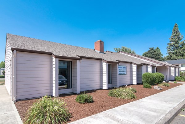 Clubhouse with modern design elements at Meadowlawn Apartments, ideal for social gatherings and leisure