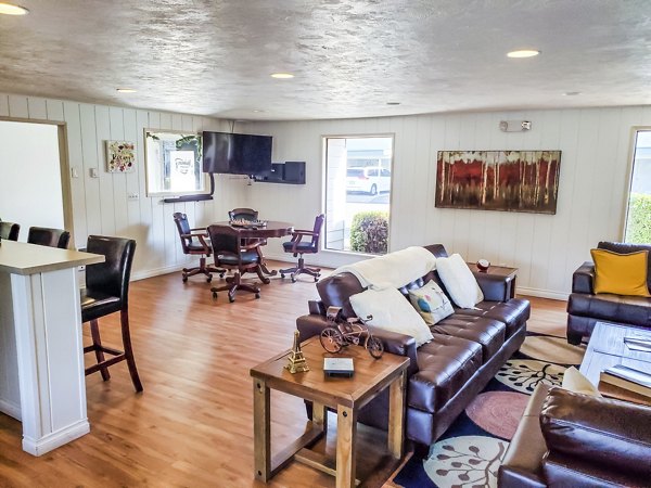 Clubhouse featuring modern design and leisure facilities at Meadowlawn Apartments