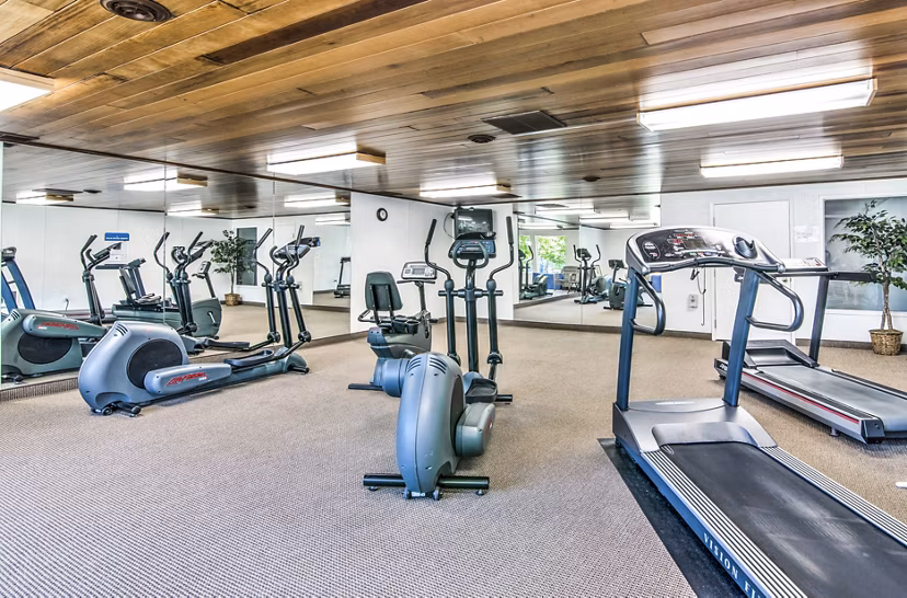 Modern fitness center with state-of-the-art equipment at Meadowlawn Apartments
