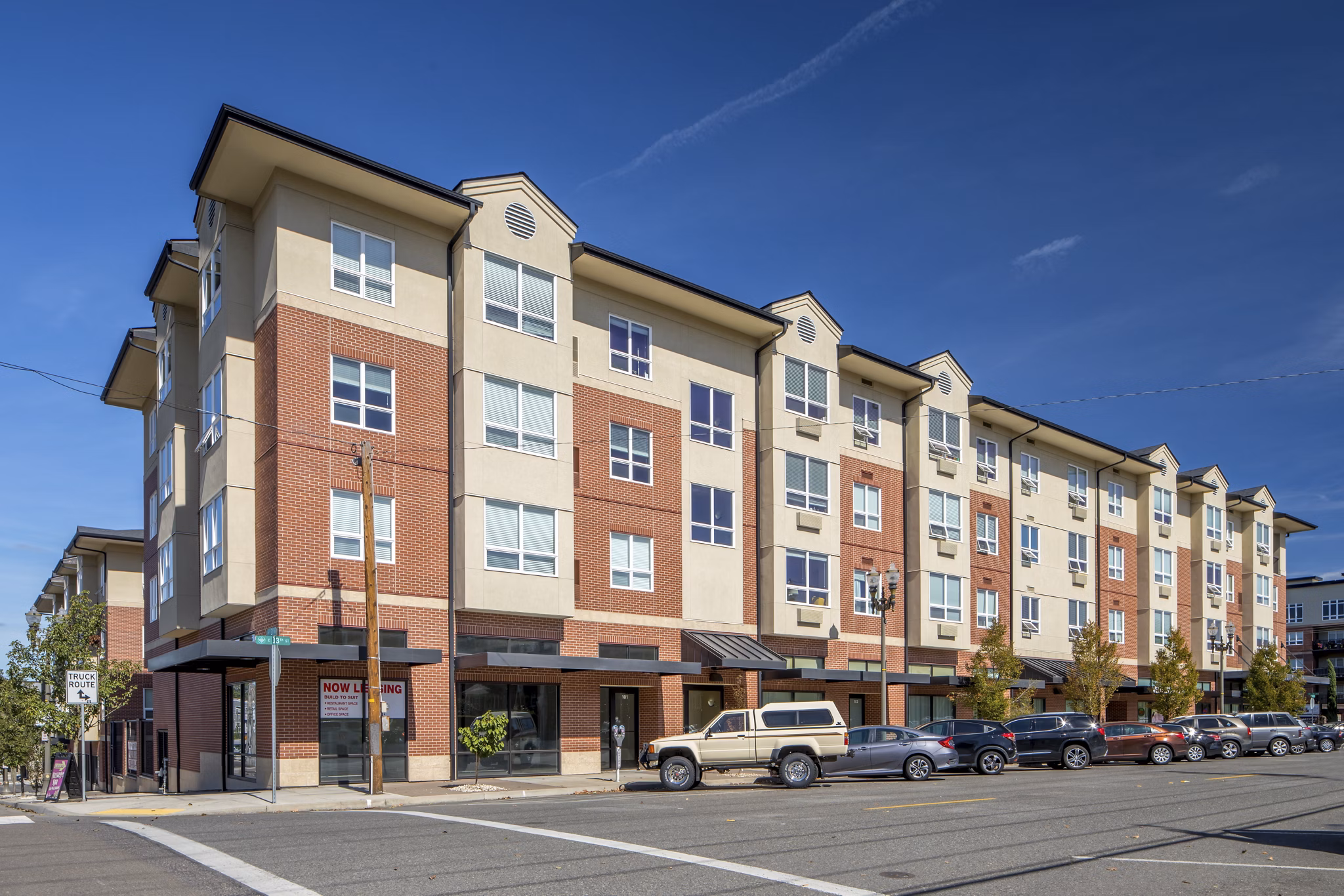 The Felix Apartments: Modern luxury with landscaped gardens in vibrant neighborhood