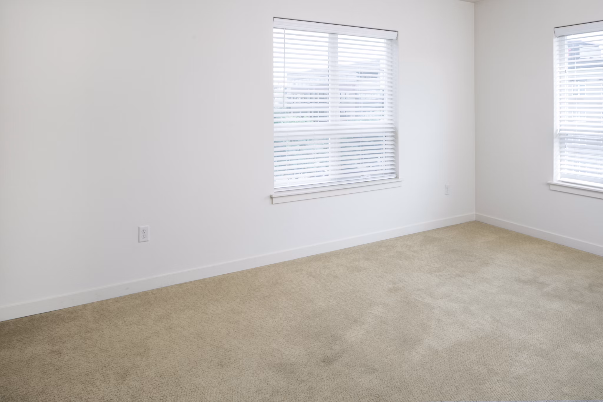 Cozy bedroom with modern decor at The Felix Apartments, offering luxury living in a prime location Ideal for stylish and comfortable home seekers