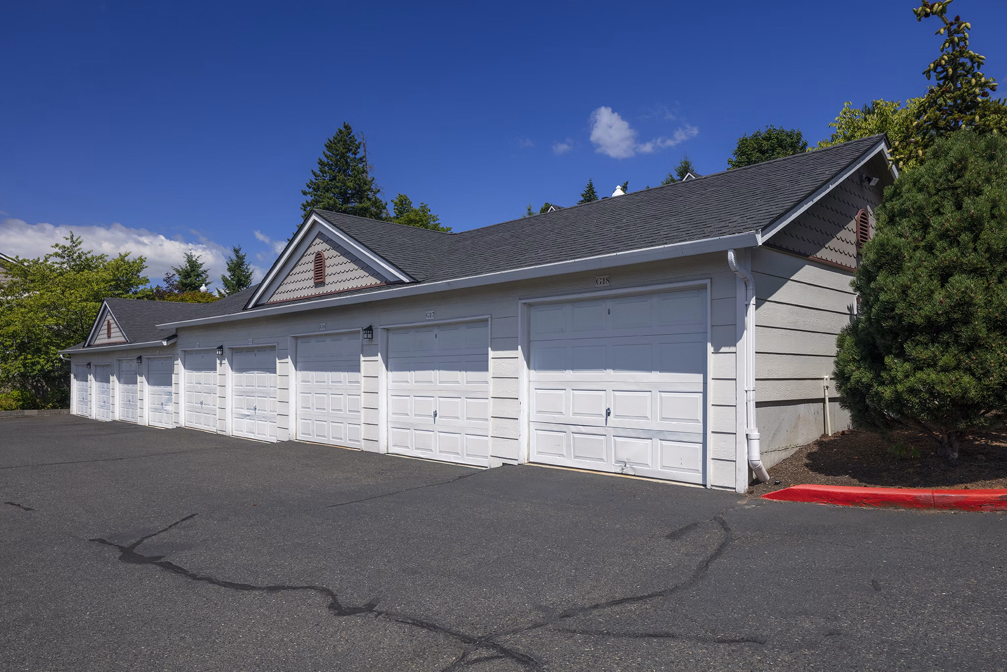 Spacious parking garage at Highland Hills Apartments with secure access and ample lighting