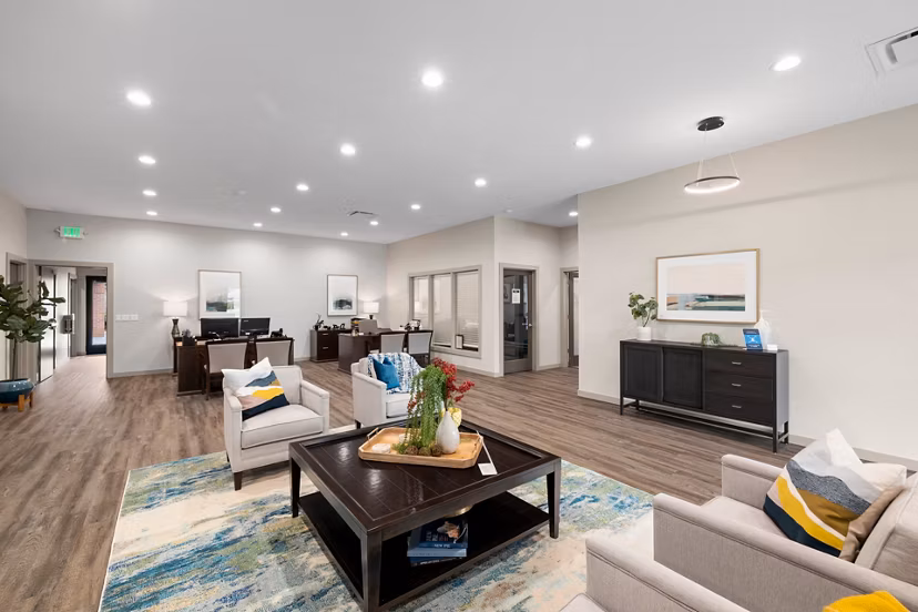 Clubhouse with modern decor and spacious seating at Highland Hills Apartments, perfect for social gatherings and community events