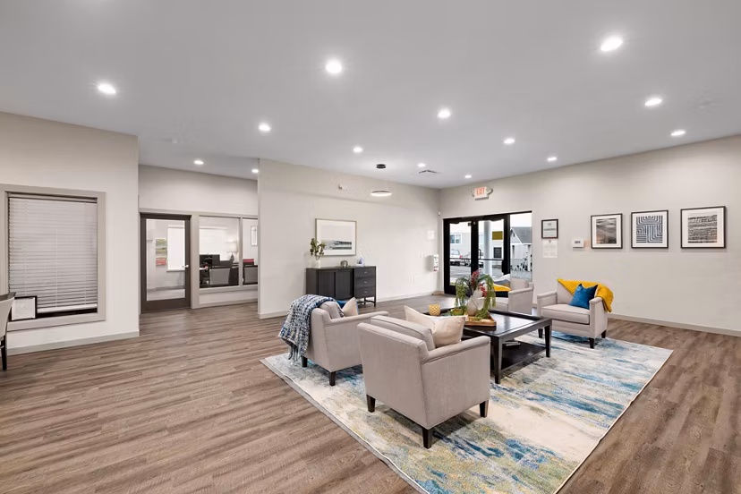 Elegant clubhouse with cozy seating and modern decor at Highland Hills Apartments