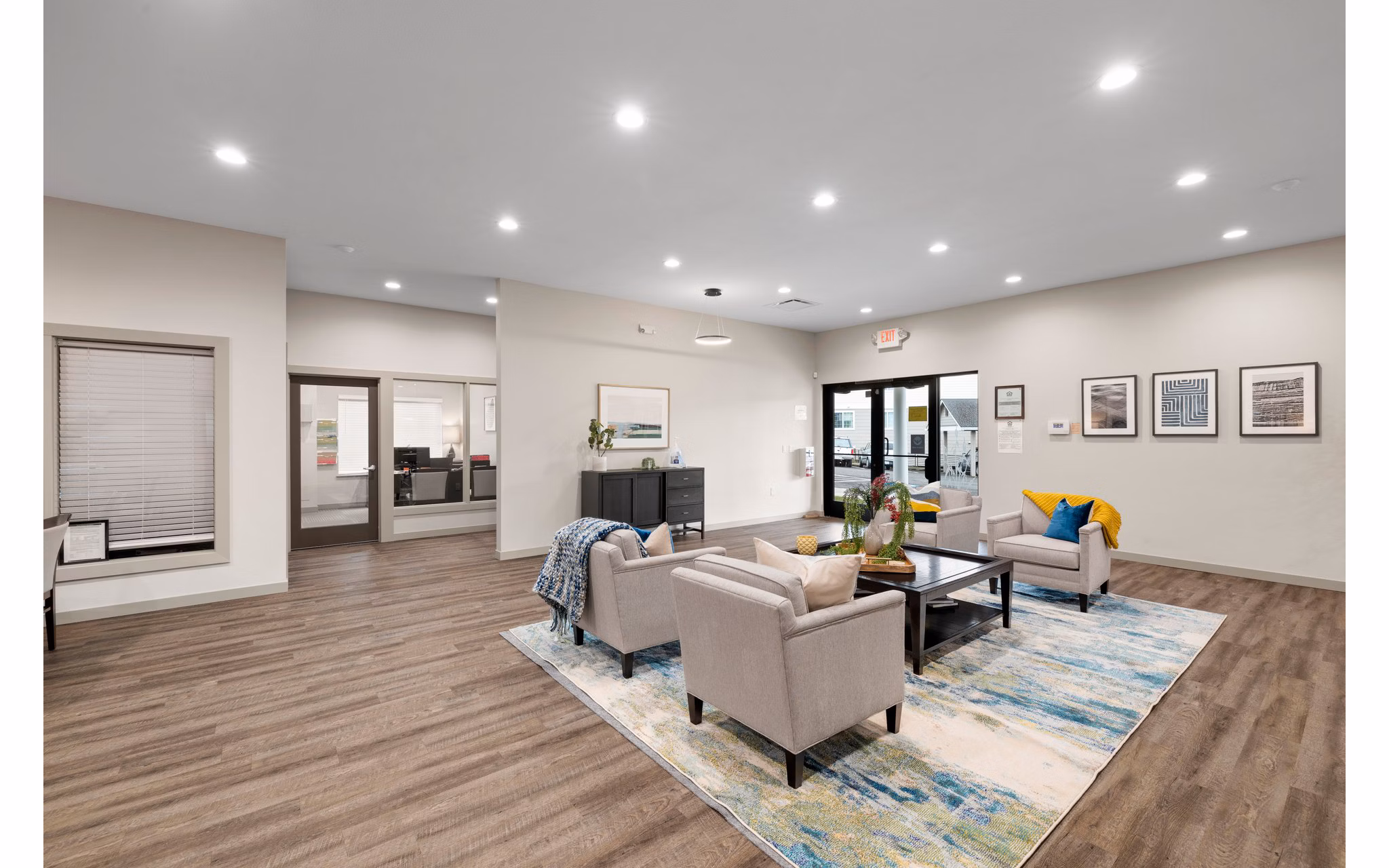 Elegant clubhouse with cozy seating and modern decor at Highland Hills Apartments