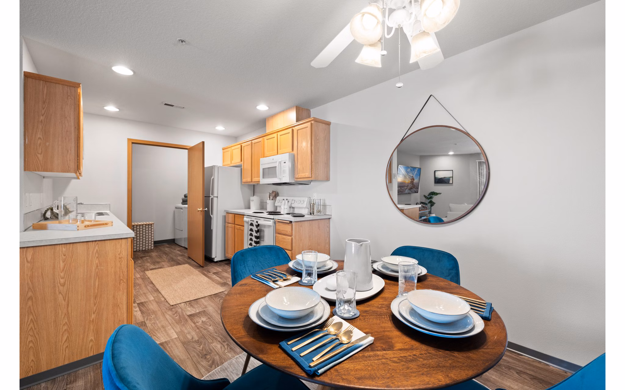 Dining area featuring modern decor and elegant lighting at Highland Hills Apartments