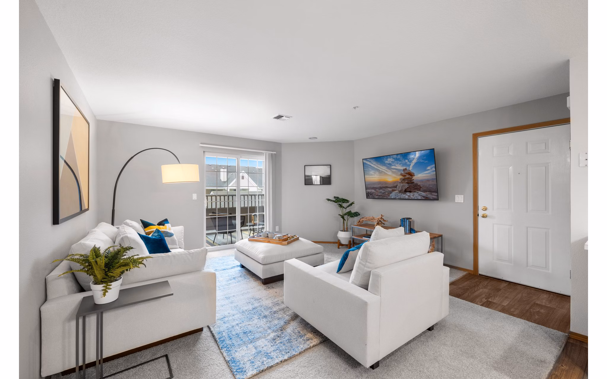 Cozy living room featuring plush seating and modern dÃ©cor at Highland Hills Apartments