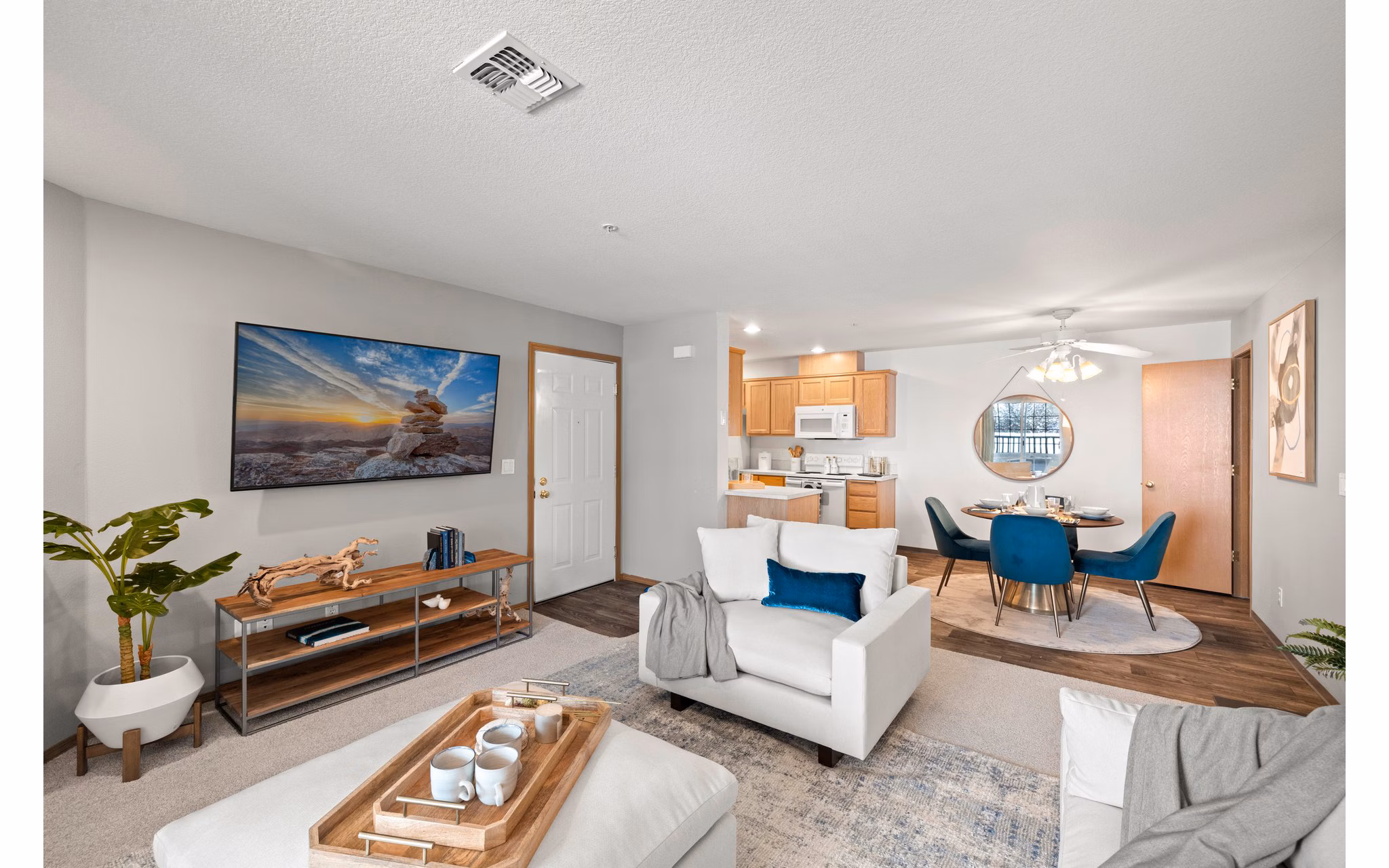 Spacious living room with modern decor in Highland Hills Apartments